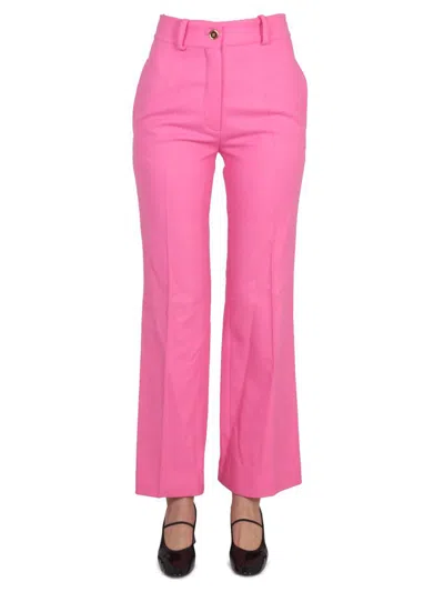 Patou Flared Leg High Waist Trousers In Pink