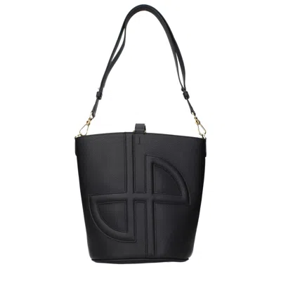 Patou Embossed Logo Leather Crossbody Bag In Black