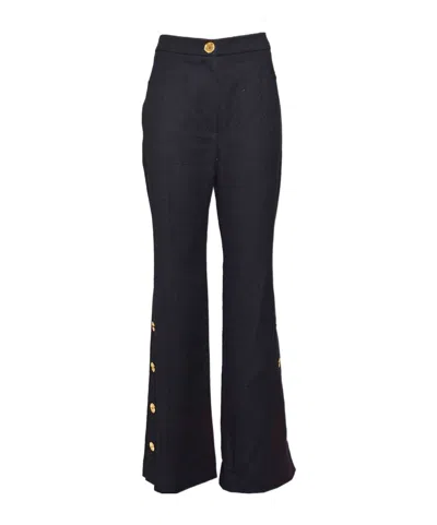 Patou Button-detailed Tweed Flared Trousers In Black