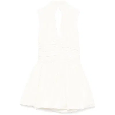 Patou Dresses In White