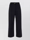 Patou Flared High-waisted Wool Blend Trousers In Black