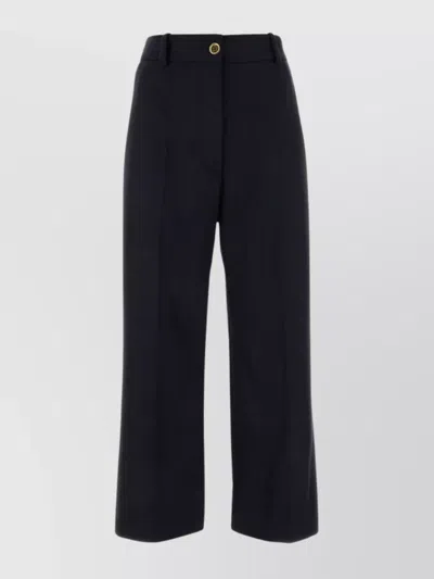 Patou Flared High-waisted Wool Blend Trousers In Blue