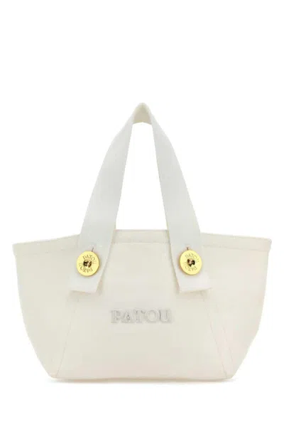 Patou Handbags. In White