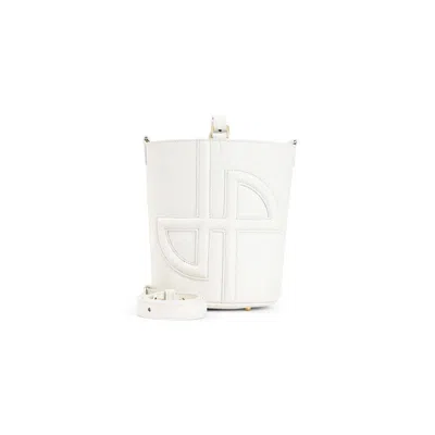 Patou Leather Bucket Handbag With Adjustable Strap In Beige