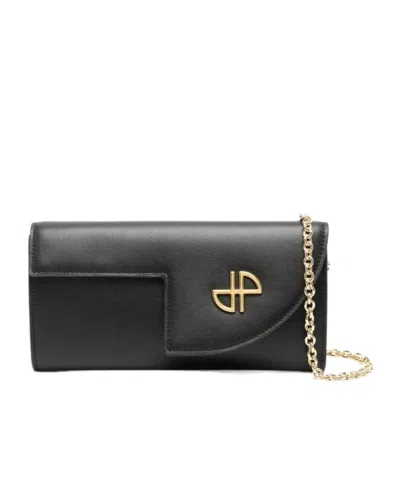 Patou Jp Leather Clutch Bag In Black
