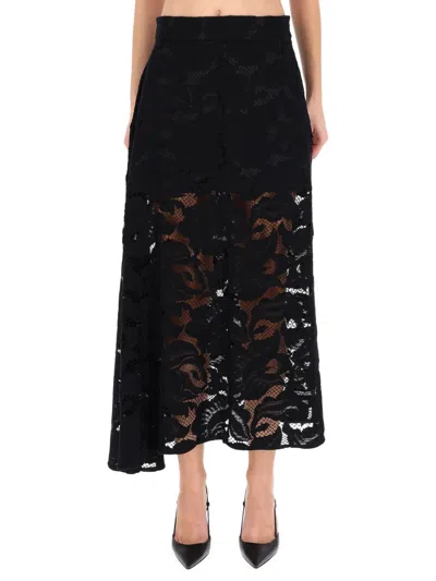 Patou Asymmetric Midi Skirt In Black