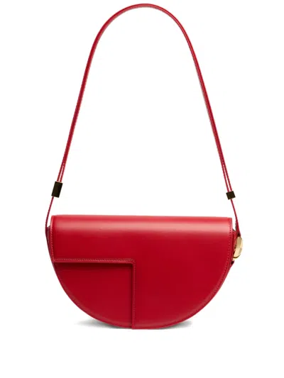 Patou Le  Half-moon Leather Shoulder Bag In Red