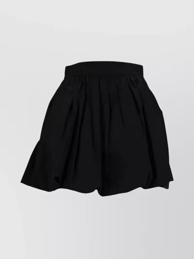 PATOU MINI SKIRT WITH HIGH WAIST AND PLEATS