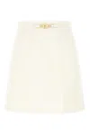 Patou Pleated Denim Mini Skirt With Gold Hardware