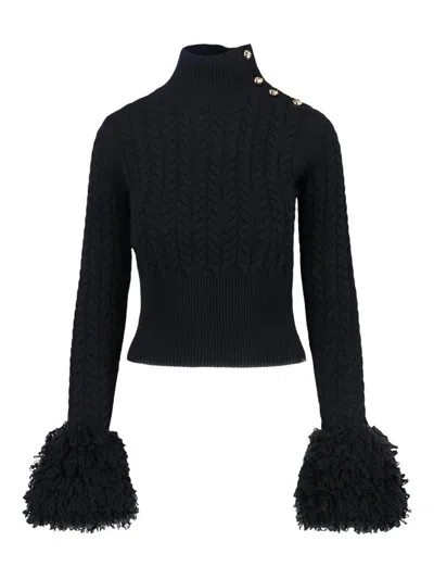 PATOU SWEATER WITH FRINGES IN WOOL AND CASHMERE