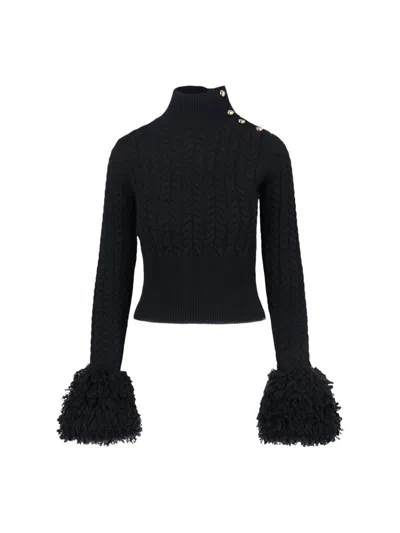 Patou Wool And Cashmere Fringed Sweater In Black