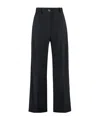 Patou Flared High-waisted Wool Blend Trousers In Black