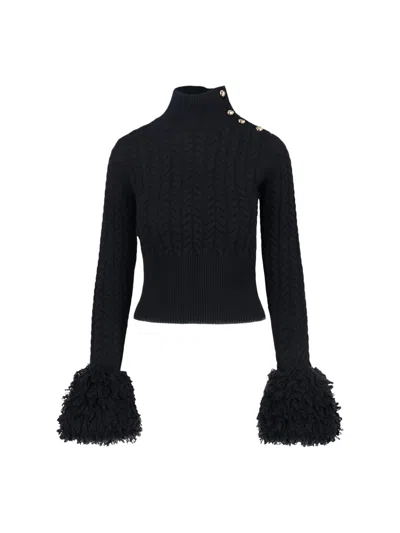 PATOU WOOL AND CASHMERE FRINGED SWEATER