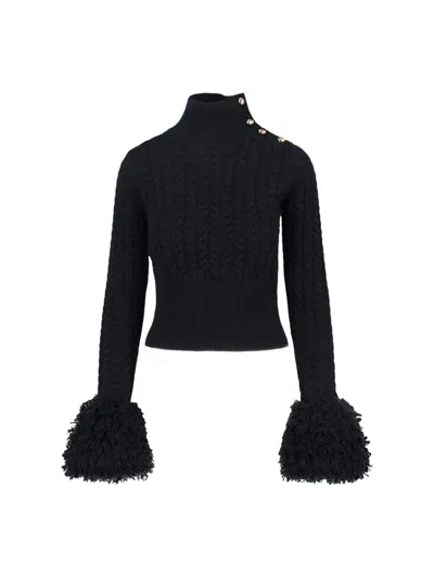 PATOU WOOL AND CASHMERE FRINGED SWEATER