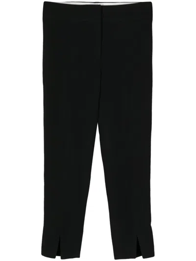Patou Wool Tapered Trousers In Black