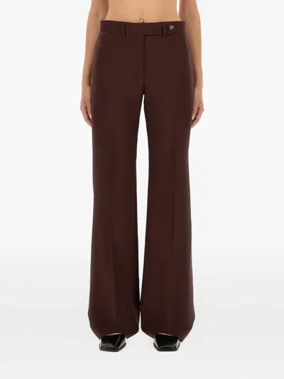 PAUL SMITH A SUIT TO TRAVEL IN BUTTONED-WOOL TROUSERS