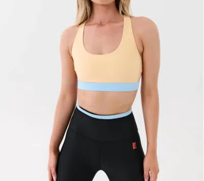 P.E NATION DENIZEN SPORTS BRA IN APRICOT SHERBET