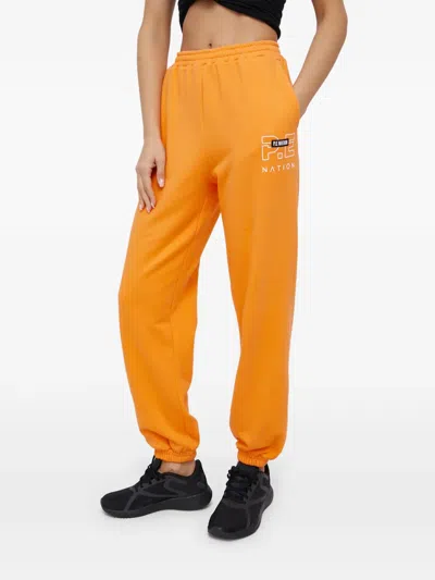 P.e Nation Fit Training Track Pants In Orange
