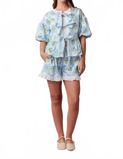 Peach Love Flower Printed With Eyelet Ruffle Detail Shorts In Blue