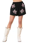 Peach Love Sequin Football Bow Shorts In Black In Black