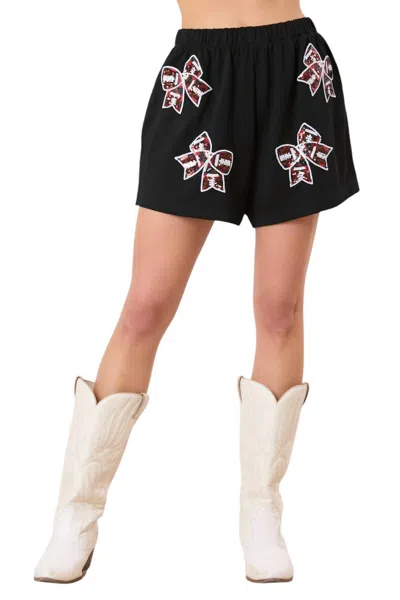 Peach Love Sequin Football Bow Shorts In Black