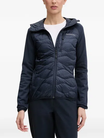 Peak Performance Helium Quilted Hooded Jacket In Blue