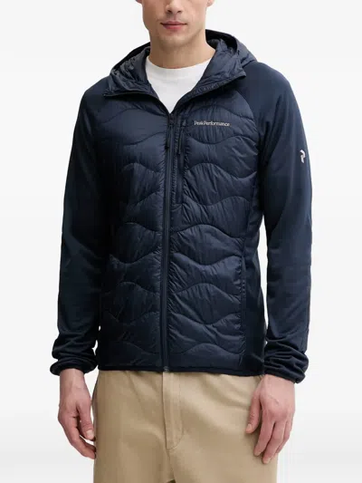 Peak Performance Helium Quilted Hooded Jacket In Blue