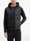 Peak Performance Quilted Hooded Jacket In Black