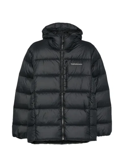 Peak Performance Quilted Hooded Jacket In Black