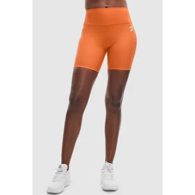 Peloton Cadent 7" High Rise Pocket Bike Short In Orange