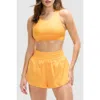 Peloton Cadent Mid Neck V Strap Bra In Amber