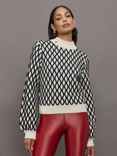 PERFECT MOMENT CARVING MERINO WOOL SWEATER