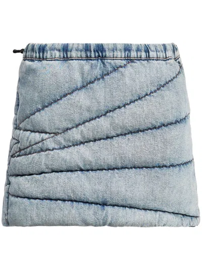Perfect Moment Quilted Denim Mini Skirt In Light-denim