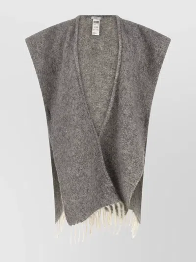 PESERICO TEXTURED FRINGE CAPE MADE FROM BOUCLÉ YARN