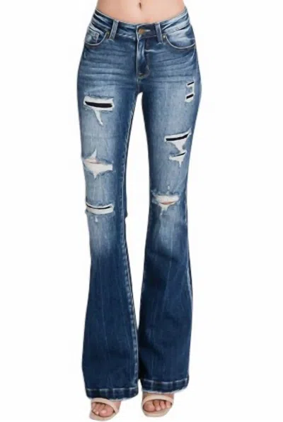 Petra153 Destroyed Mid Rise Stretch Flare Jeans With Patch - Petite In Medium Wash In Blue