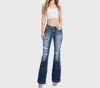 Petra153 Megan Petite Destroyed Mid Rise Stretch Flare Jean With Patch In Blue In Blue