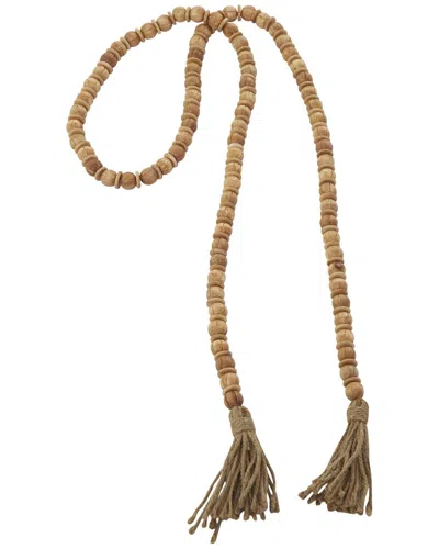 Peyton Lane Mango Wood Handmade Beaded Garland With Tassel In Brown