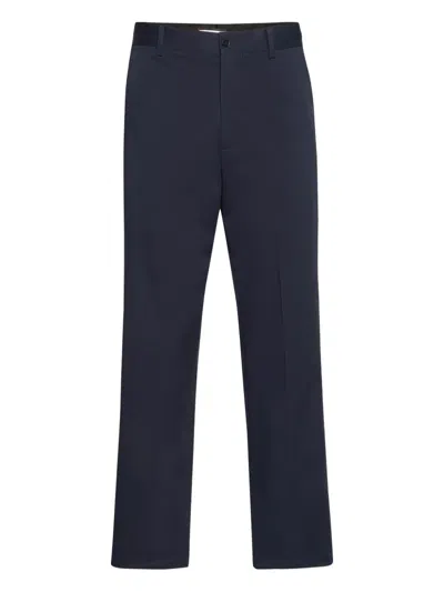 Philipp Plein Logo-plaque Trousers In Blue