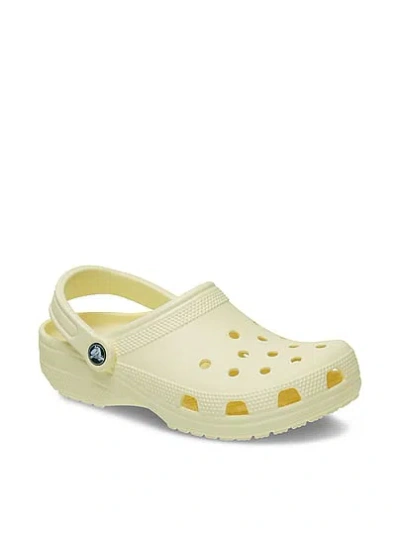 Pink Crocs Classic Solid Clogs In Yellow