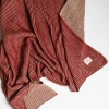 Pink Lemonade Ribbed Organic Cotton Throw Blanket In Brown