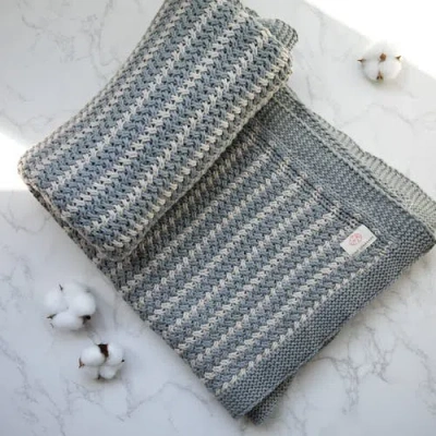 Pink Lemonade Tara Organic Cotton Throw Blanket In Gray