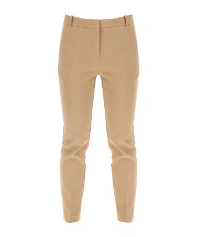 Pinko Tied Flared Halterneck Jumpsuit In Nude