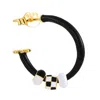 Pinnole Women's Black / White Gold Dalmata Earring Mix In Black