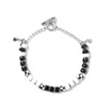Pinnole Women's Black / White Shooting Stars Bracelet