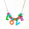 Pinnole Women's Blue Love Monogram Charm Necklace In Blue