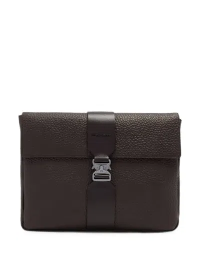 Piquadro Buckle-fastening Pebbled Clutch Bags In Brown