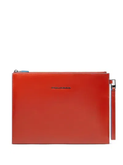 Piquadro Ipad Compartment Leather Clutch In Orange