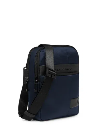 Piquadro Logo-embossed Crossbody Bag In Blue