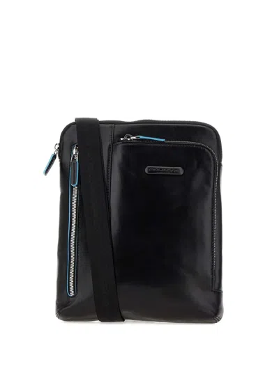 Piquadro Zip-fastening Embossed-logo Shoulder Bag In Black