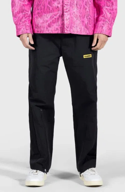 PLEASURES PLEASURES GAZE ZIP HEM TRACK PANTS